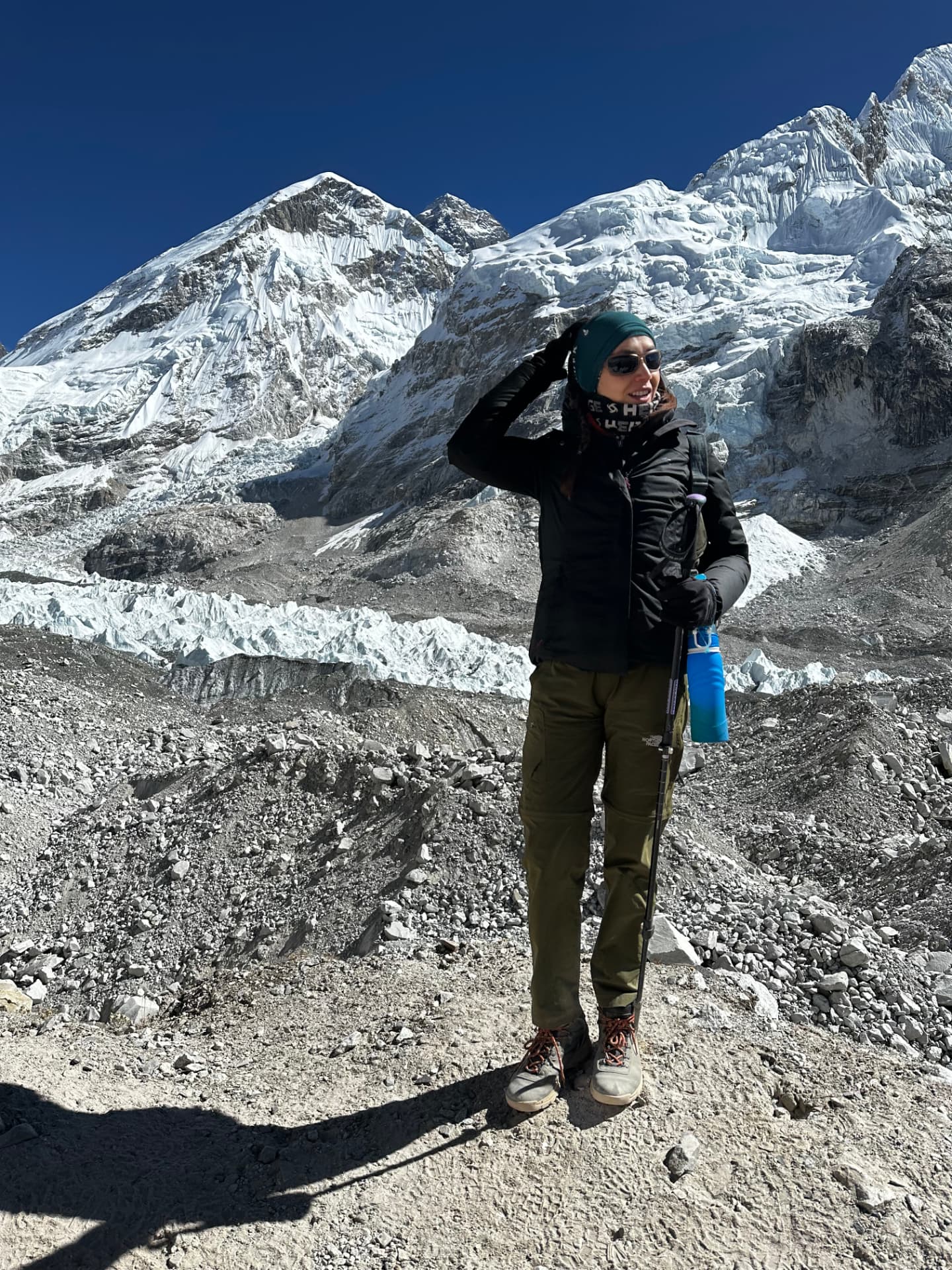 Standing on the moraine at Everest Base Camp with the Khumbu icefall behind