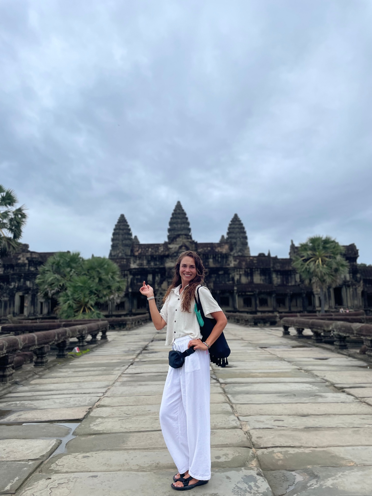 Standing before the temples of Angkor Wat